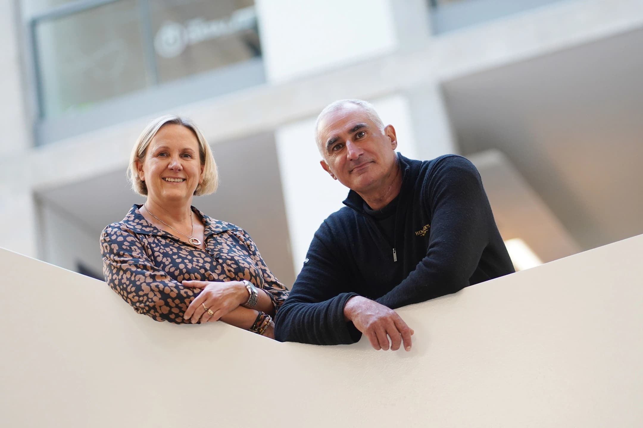 Darius and Jo standing together for press photos