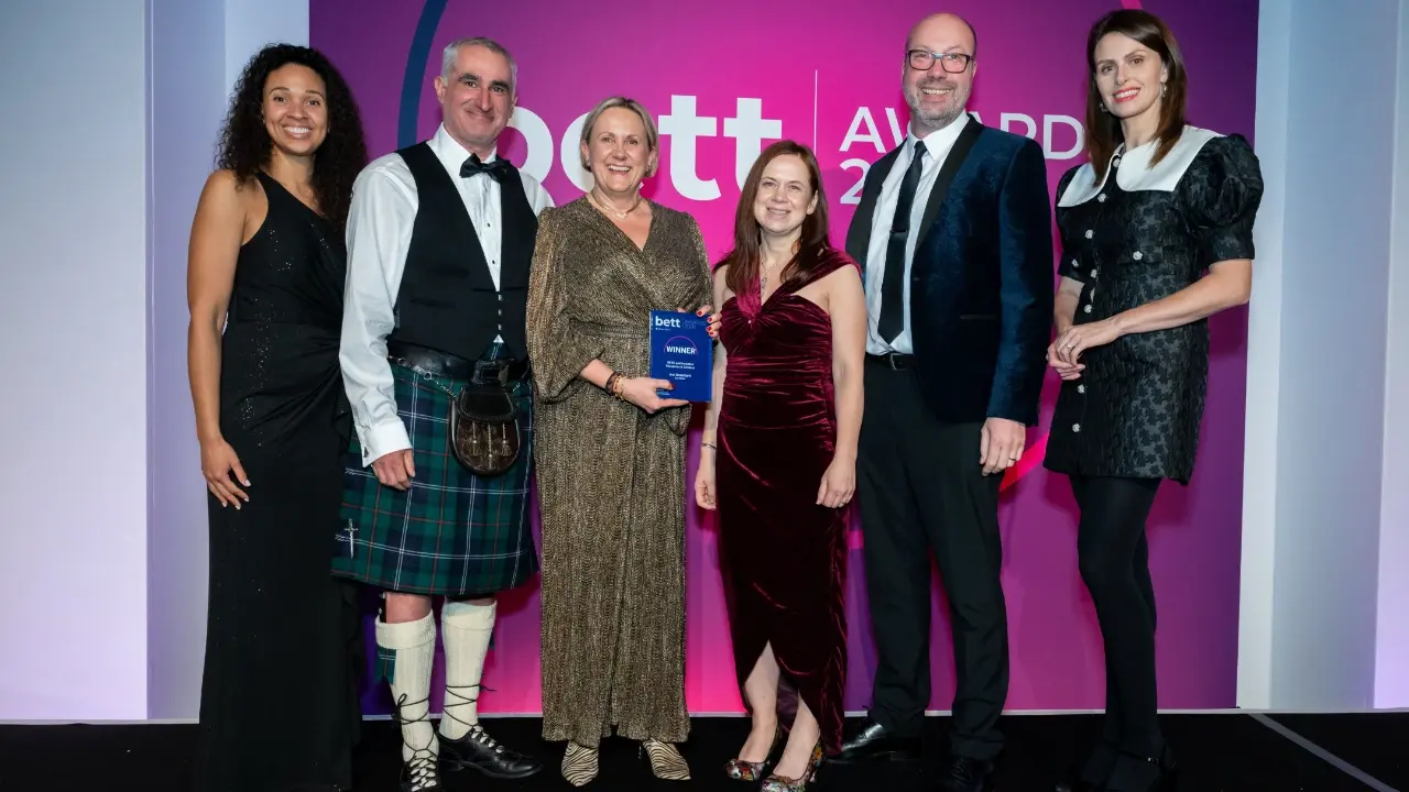 ivvi team receiving a Bett award
